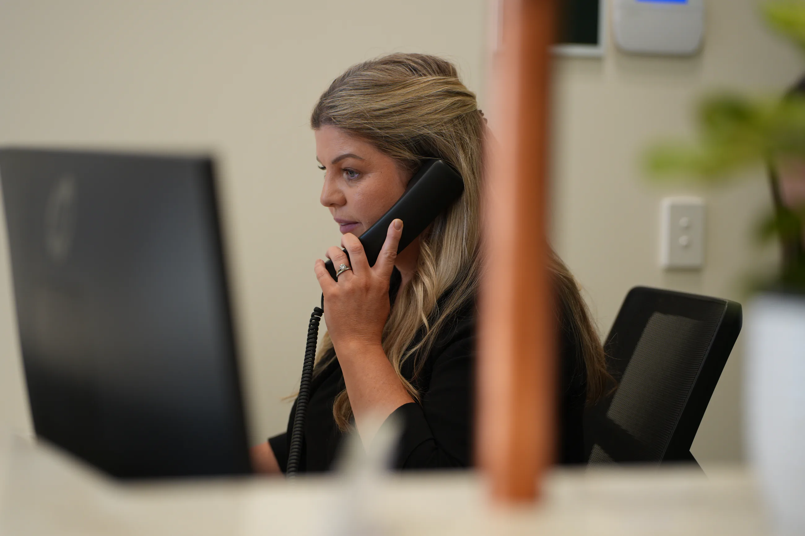 A clinician at The Dental and Implant Studio ready to help patients plan a first step