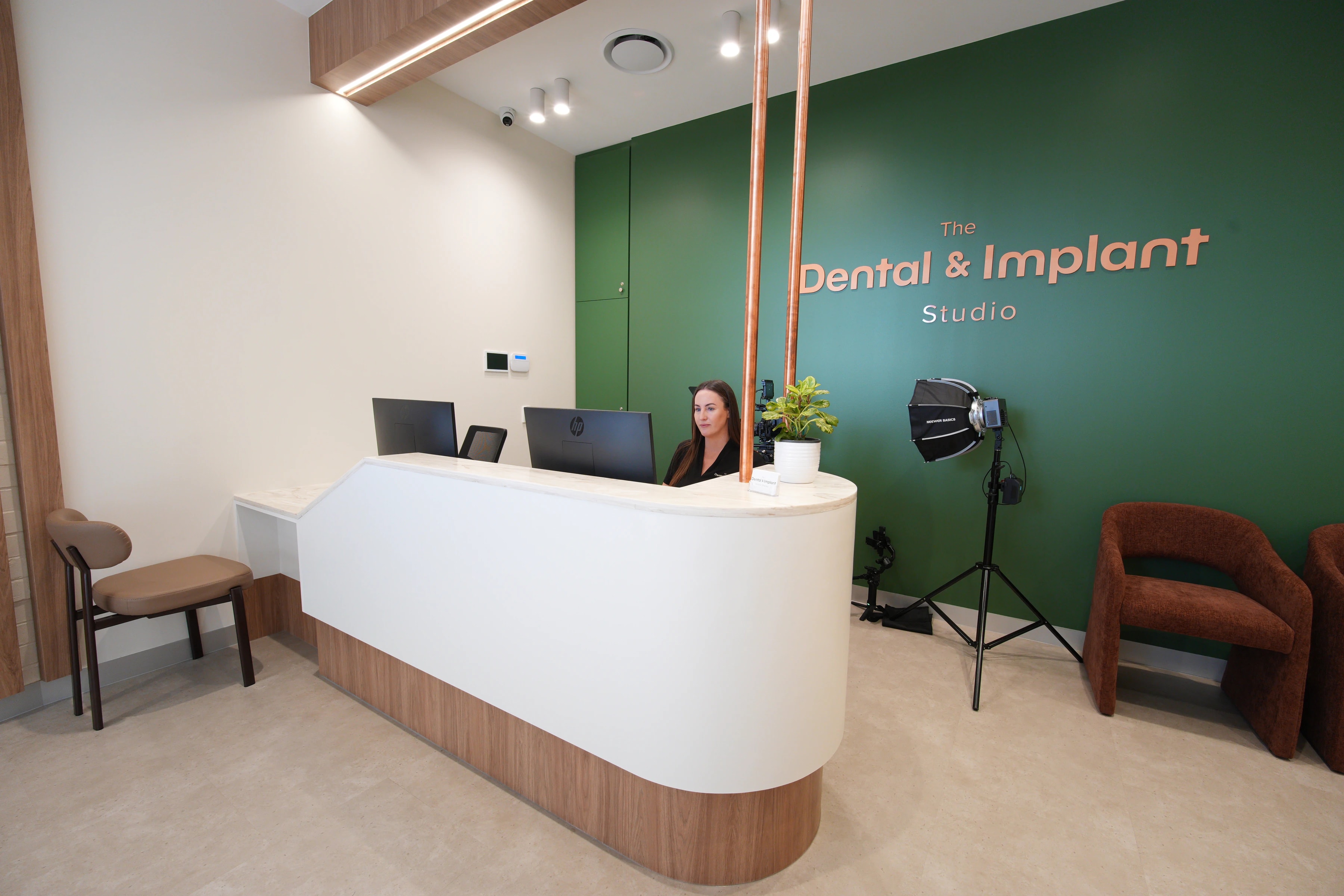 Dentist explaining scan details with a patient during a consultation
