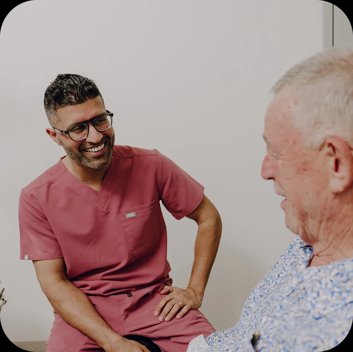 A dentist discussing implant options with a patient